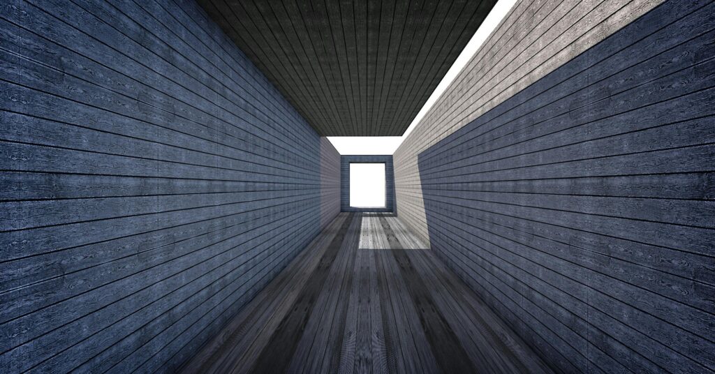 pexels photo 207153 207153 A perspective view of a wooden structure with geometric lines and bright lighting.